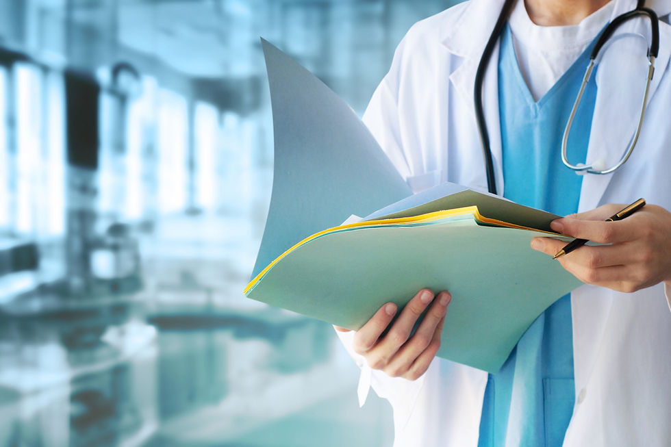 Doctor reading charts